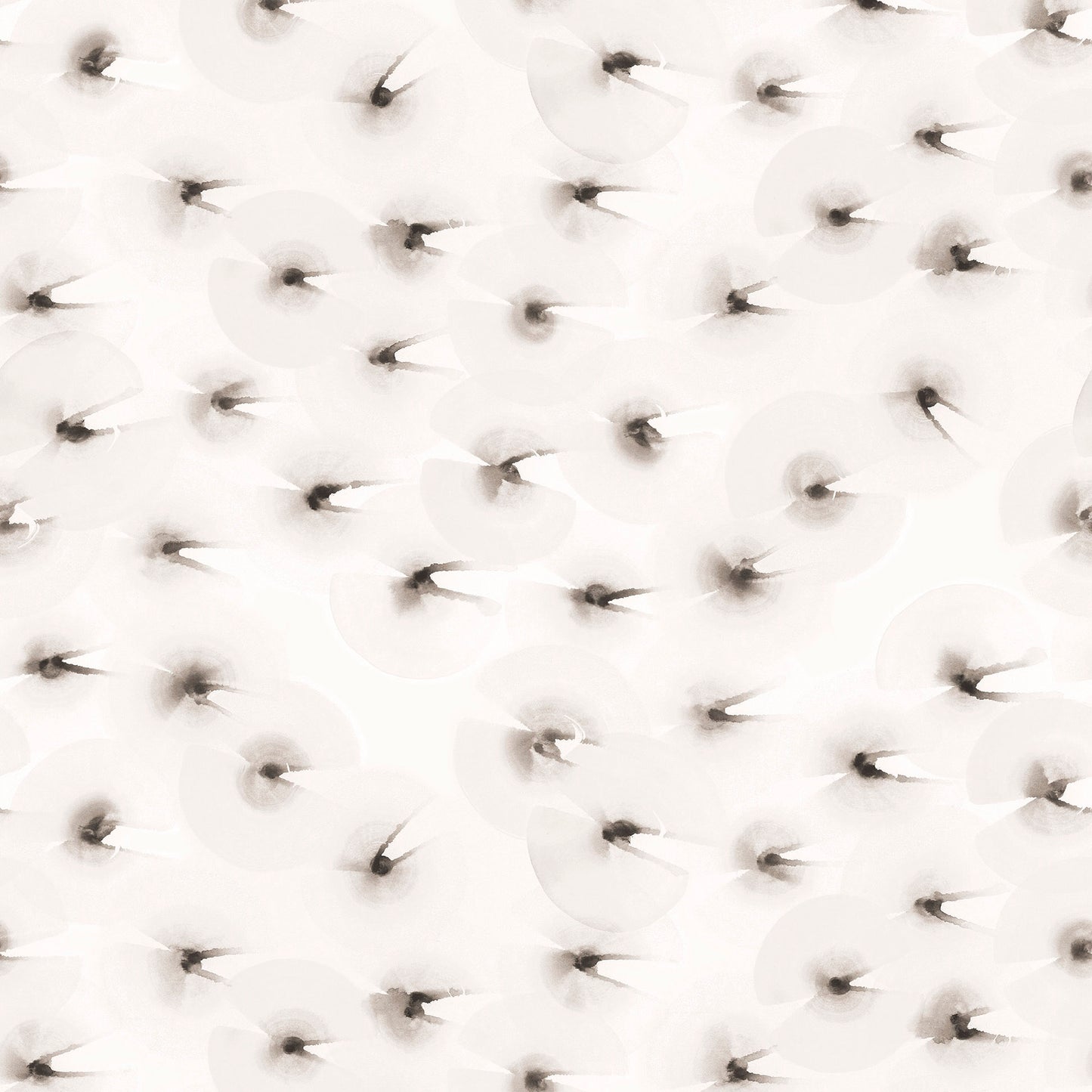Close-up of a textured white surface with small brown orbs.