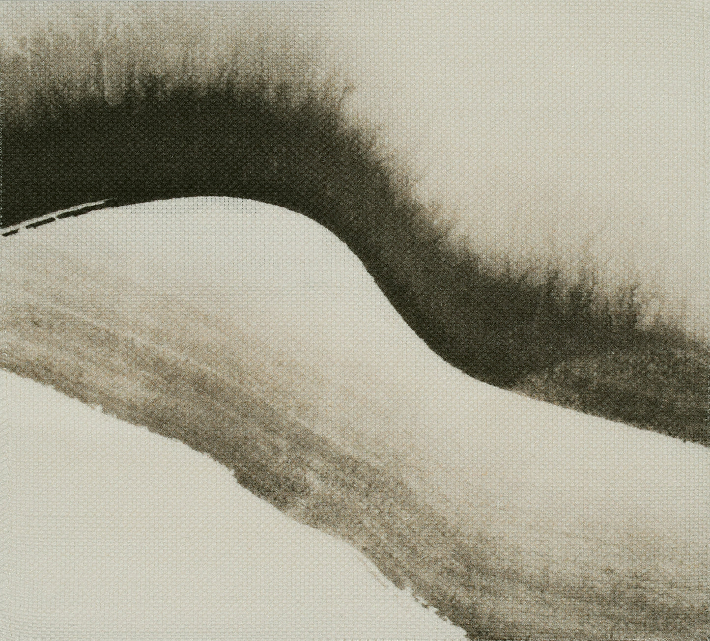 Brown brushstroke pattern on light fabric