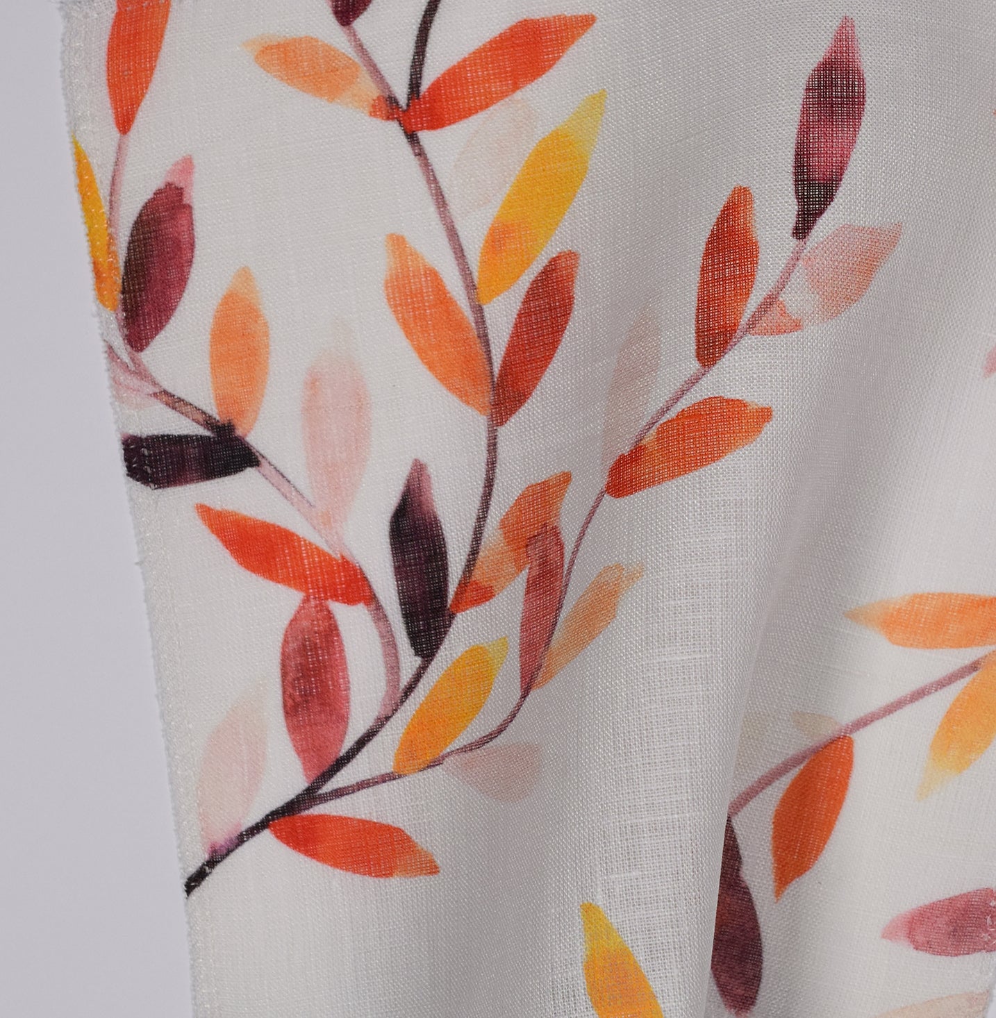Autumn leaf pattern on light sheer fabric