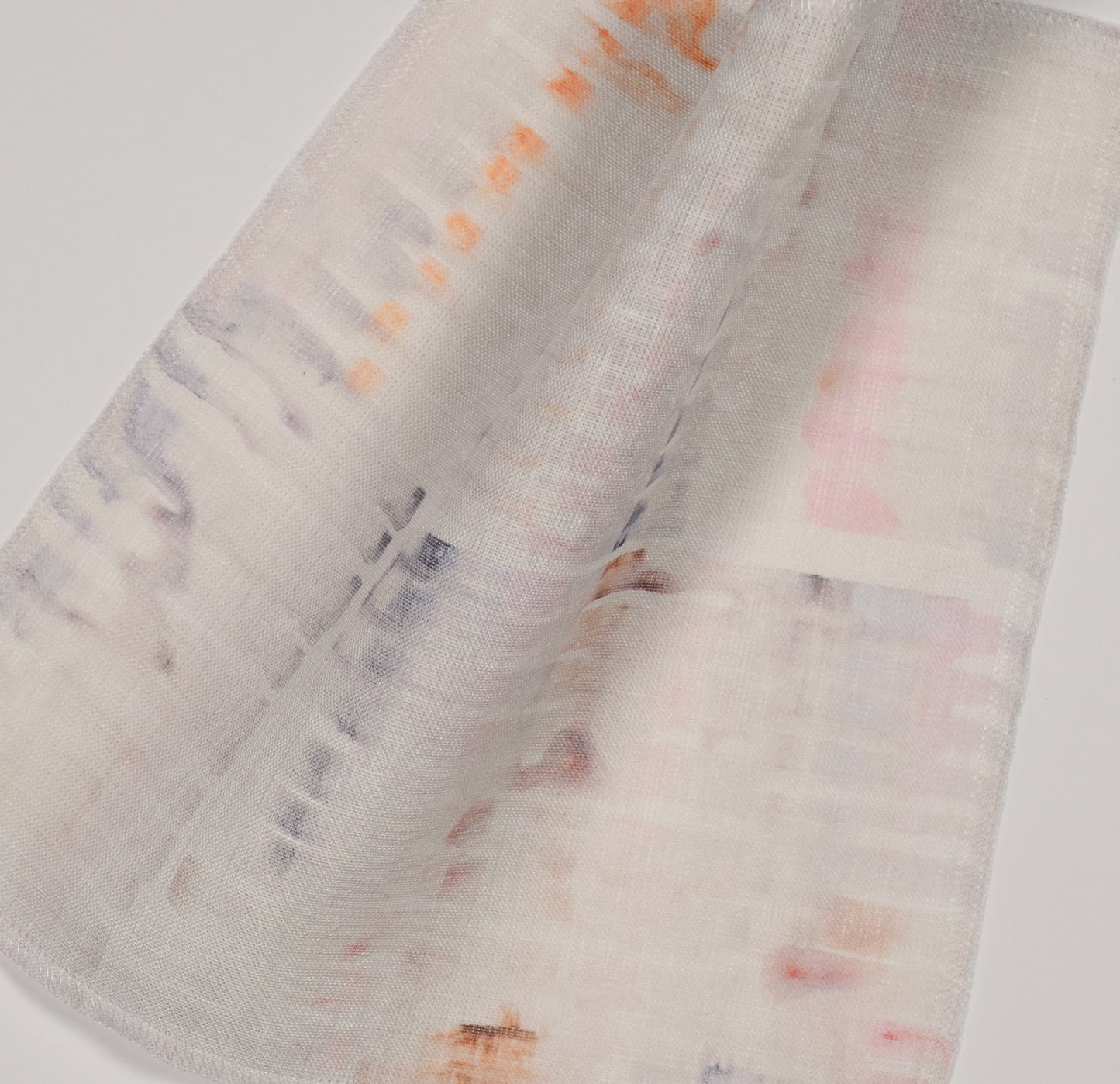 Pink and gray textured pattern on light sheer fabric