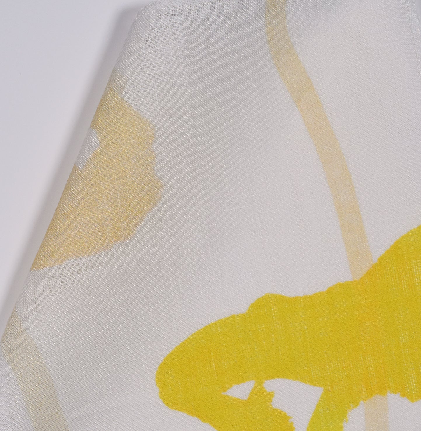 Yellow floral pattern on light sheer fabric