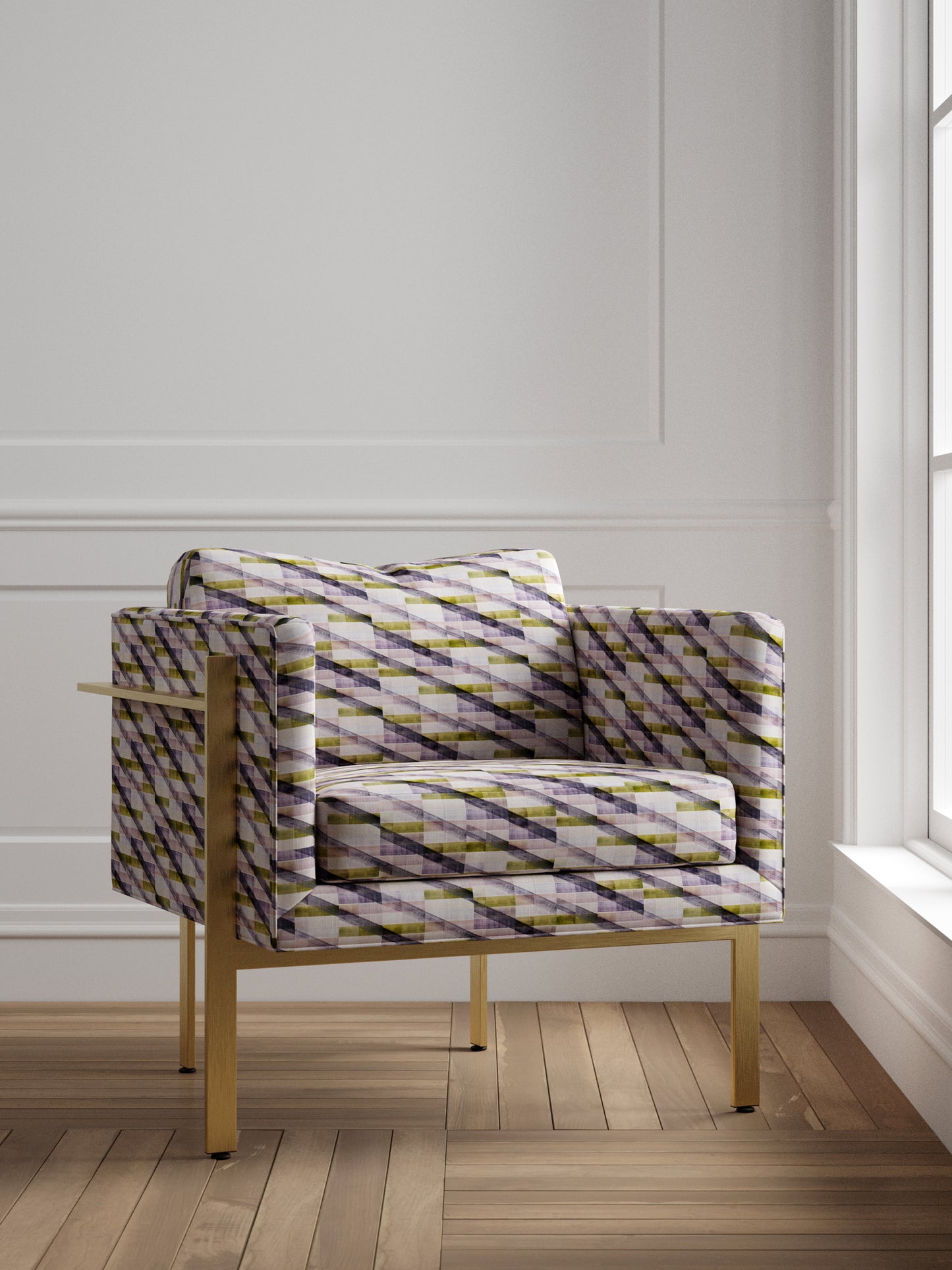 Patterned chair with gold legs in a room with white paneled walls and wooden flooring.