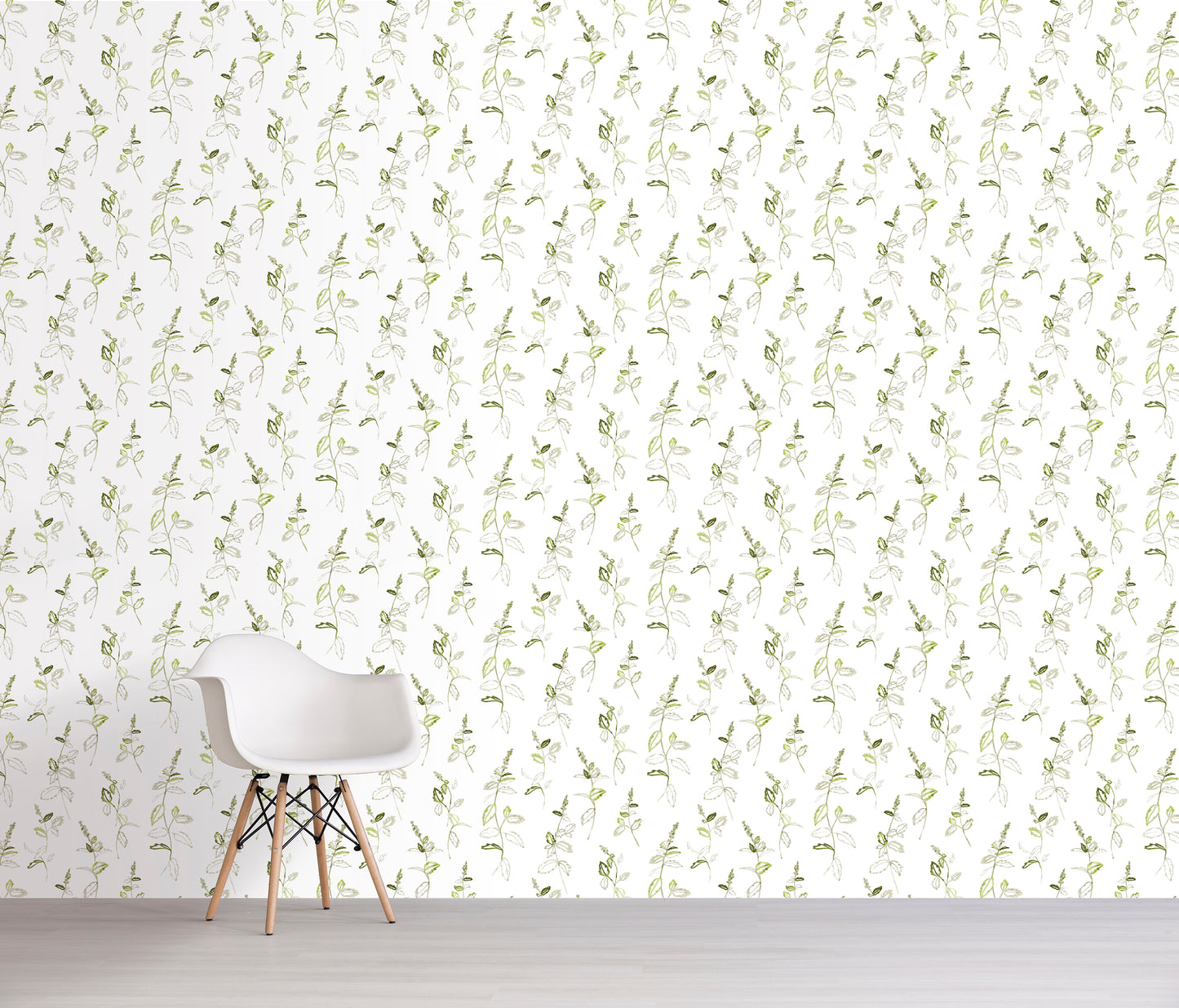 White chair in front of a wall with light green floral pattern