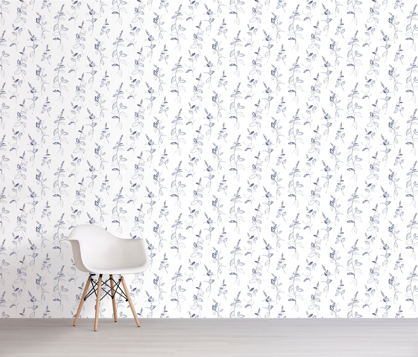 White chair in front of a wall with lavender floral patterned wallpaper