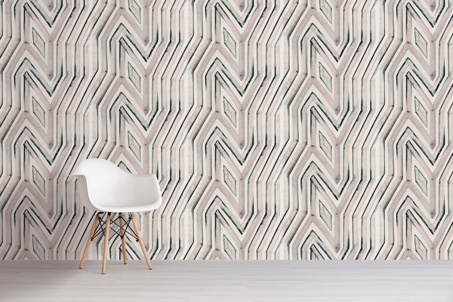 Geometric patterned wall paper with a white chair in front
