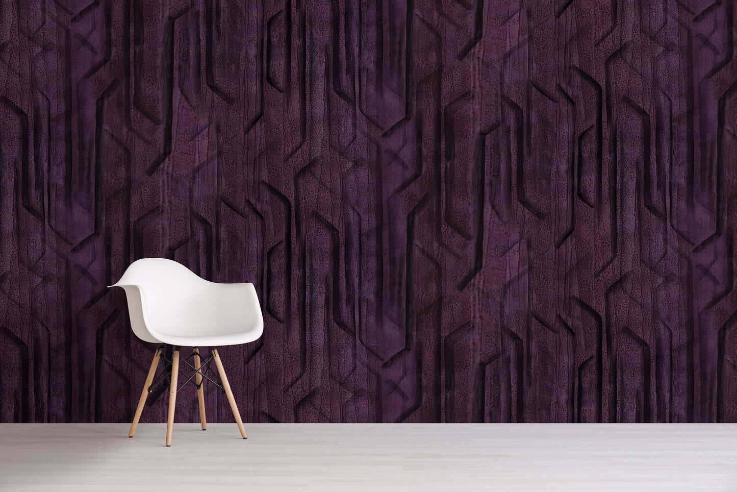 White chair against a textured purple wall