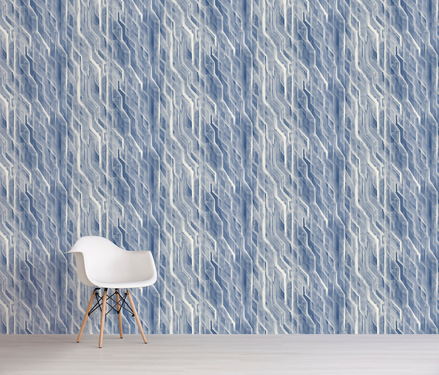 White chair against a blue geometric patterned wall