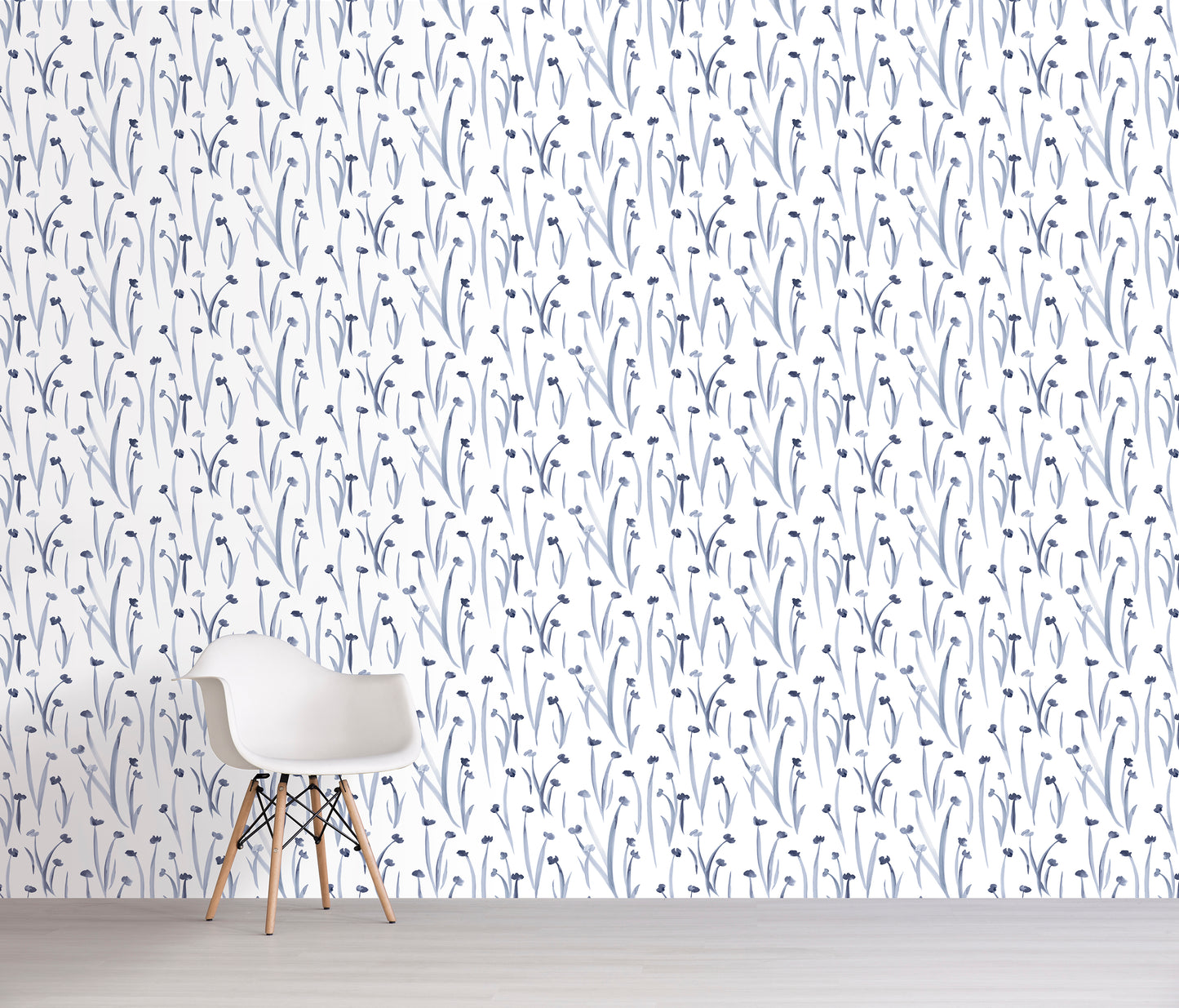 Wallpaper with blue flowers on a white background, featuring a chair against the wall.