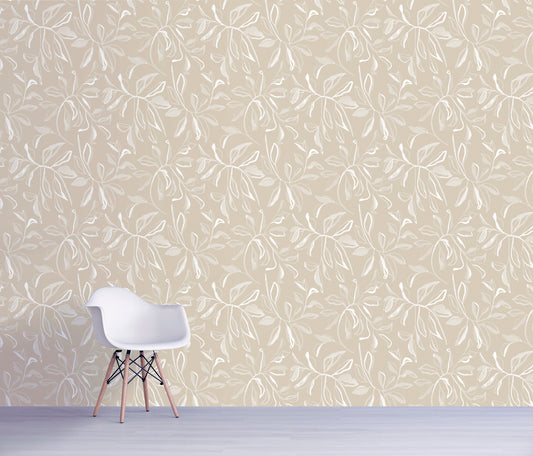 White chair against a beige floral wallpaper background