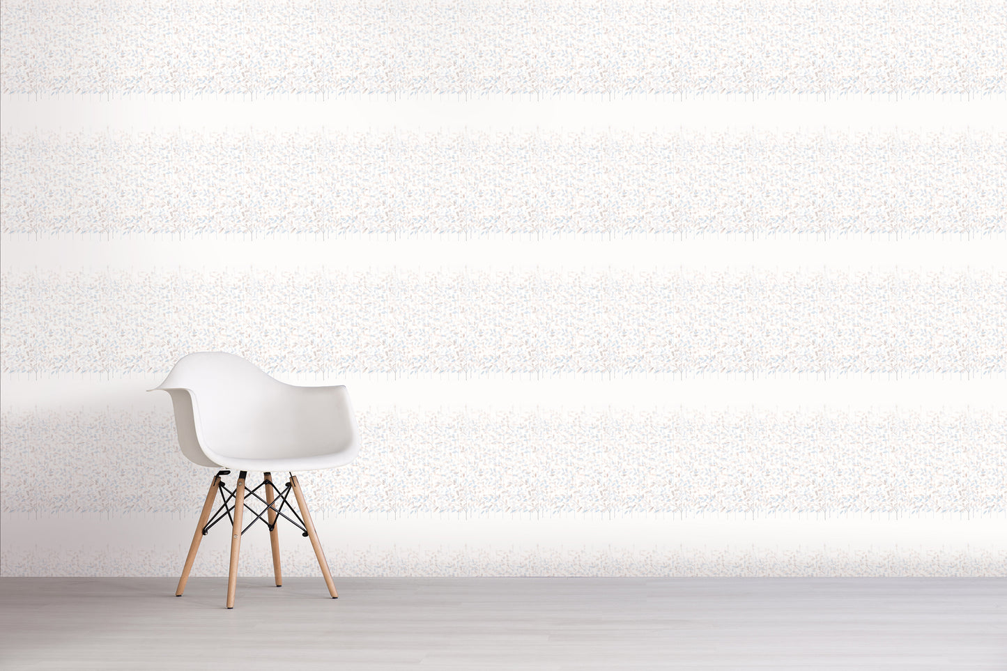 Modern white chair with wooden legs against a blue floral textured wall.