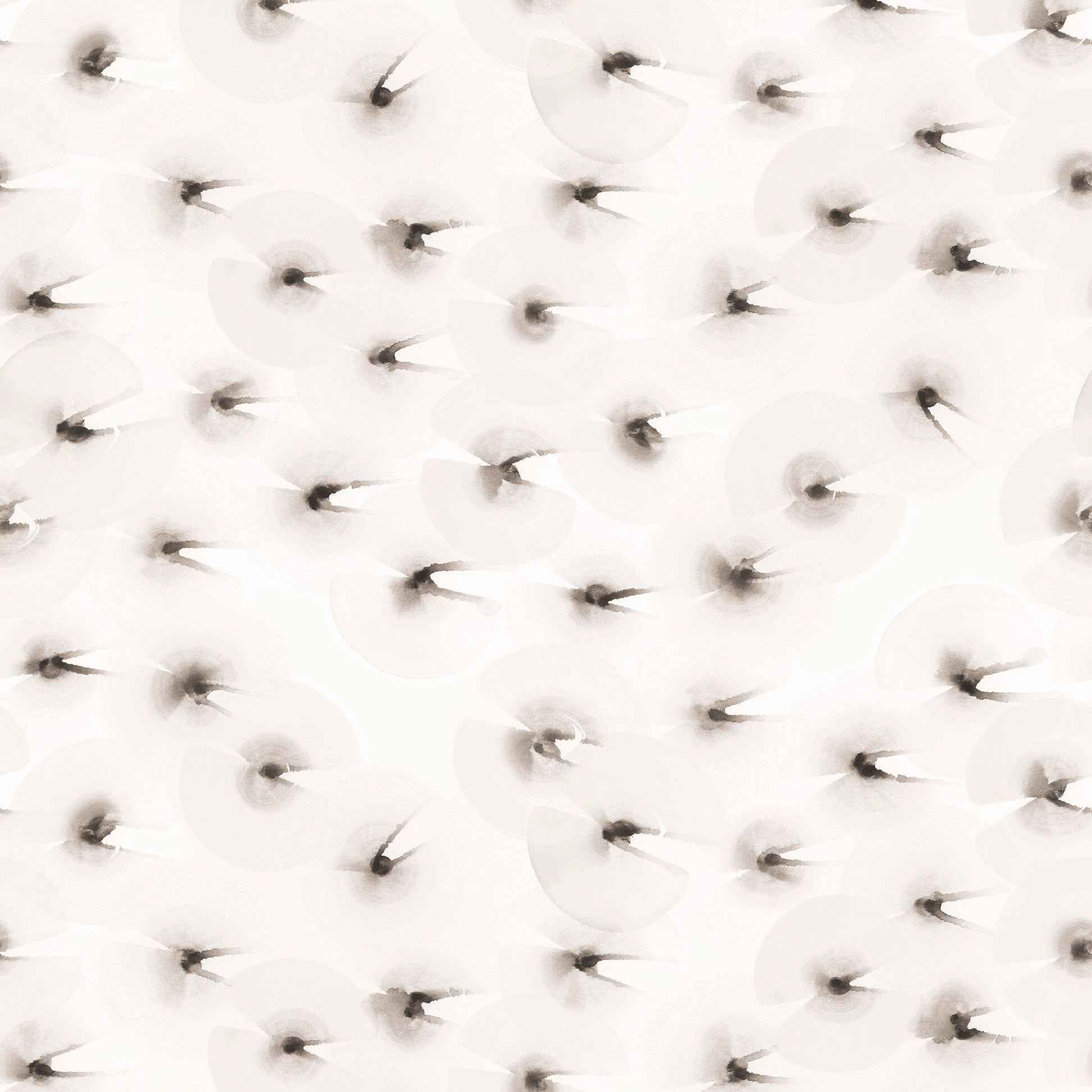 Close-up of a textured white surface with small brown orbs.