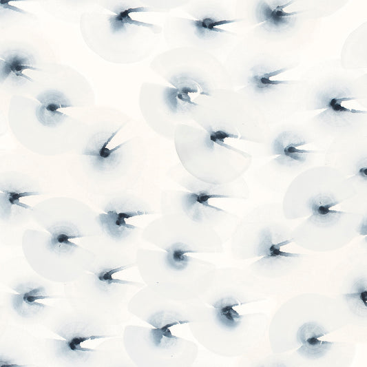 Close-up of a textured white surface with blue circular patterns