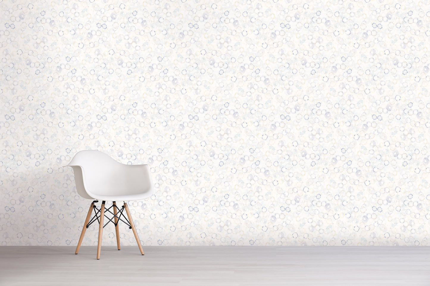 White chair against a light blue and gray wall with subtle pattern