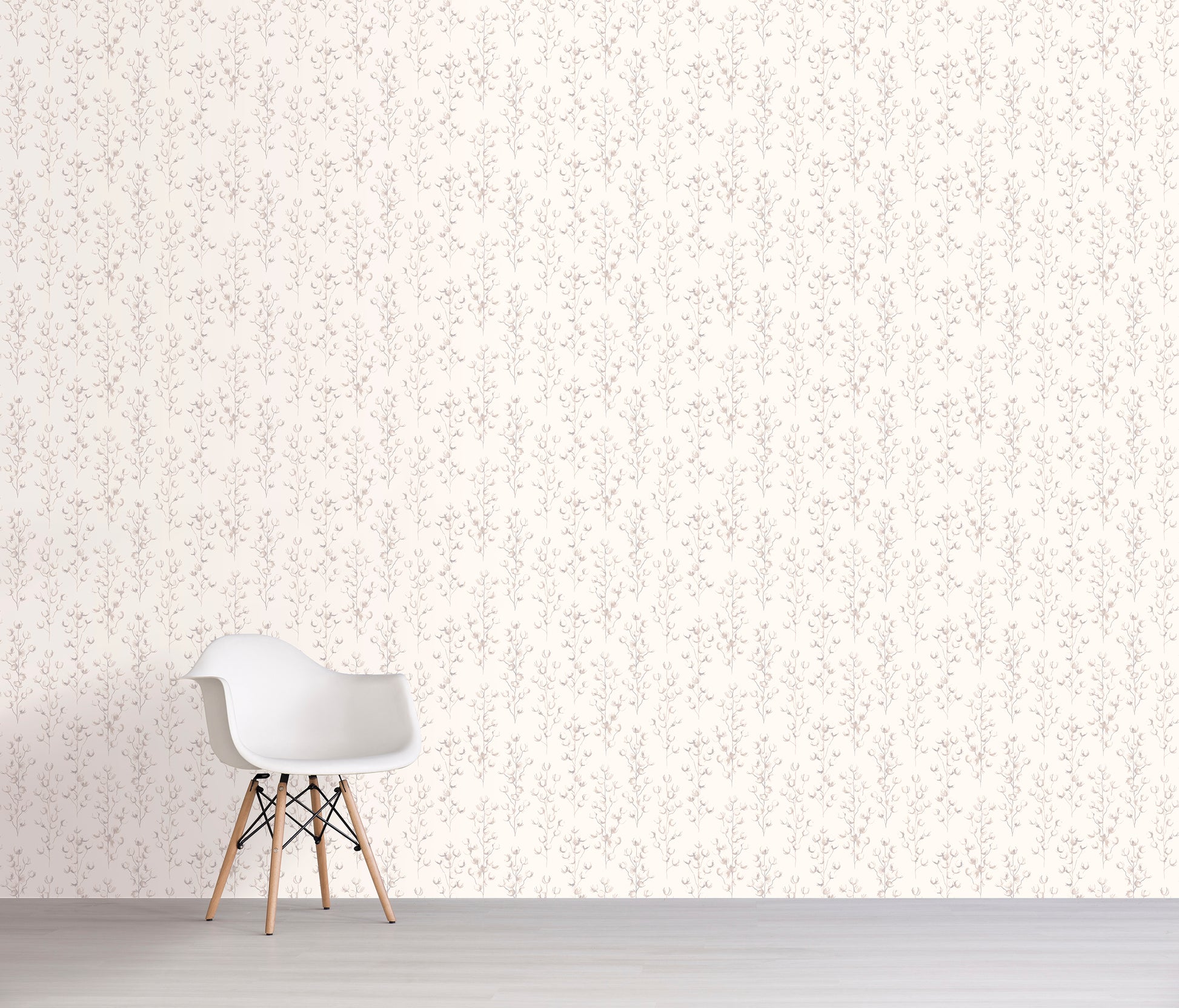 White chair against a cream floral patterned wall