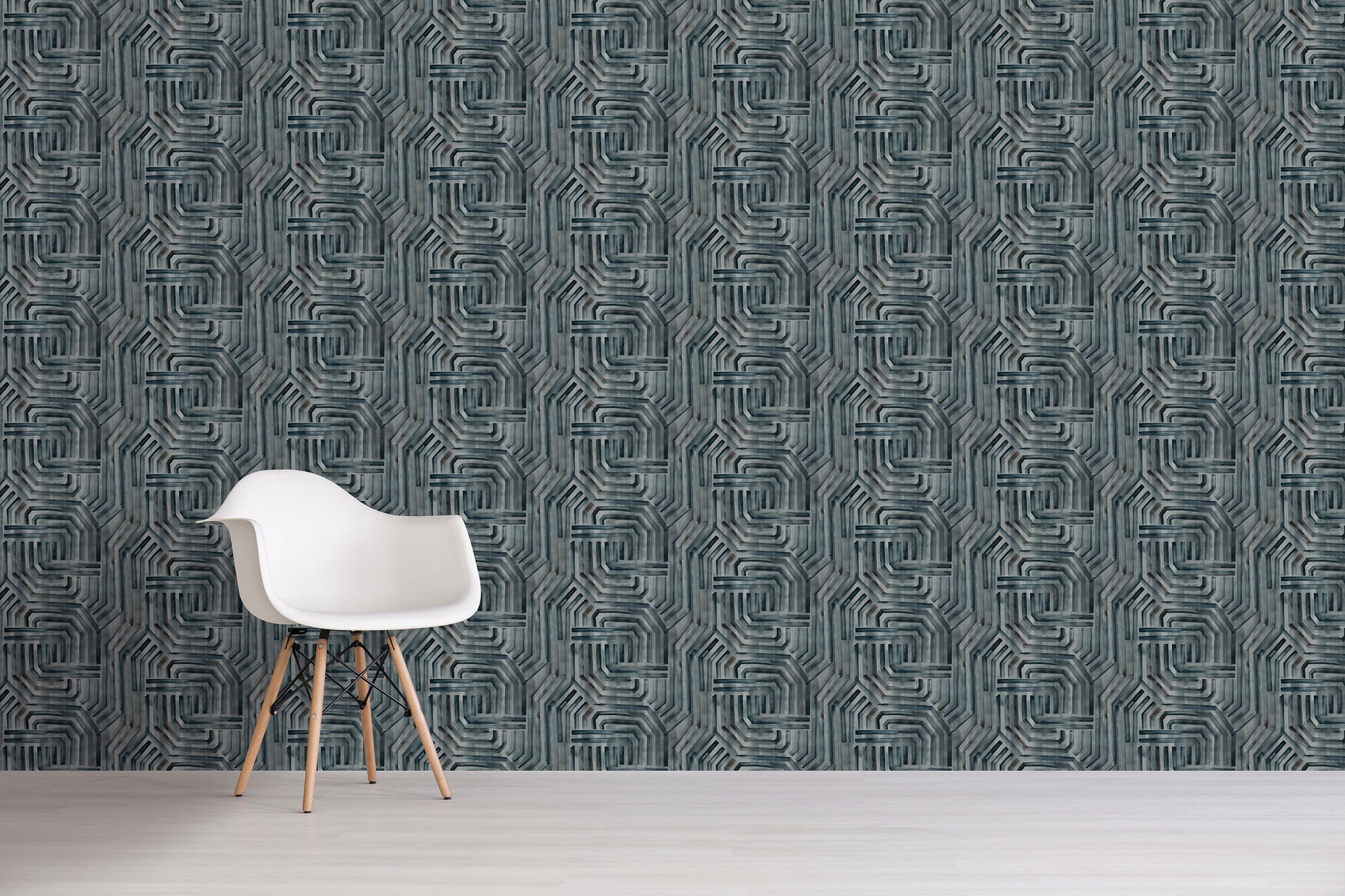 White chair against a gray geometric patterned wall