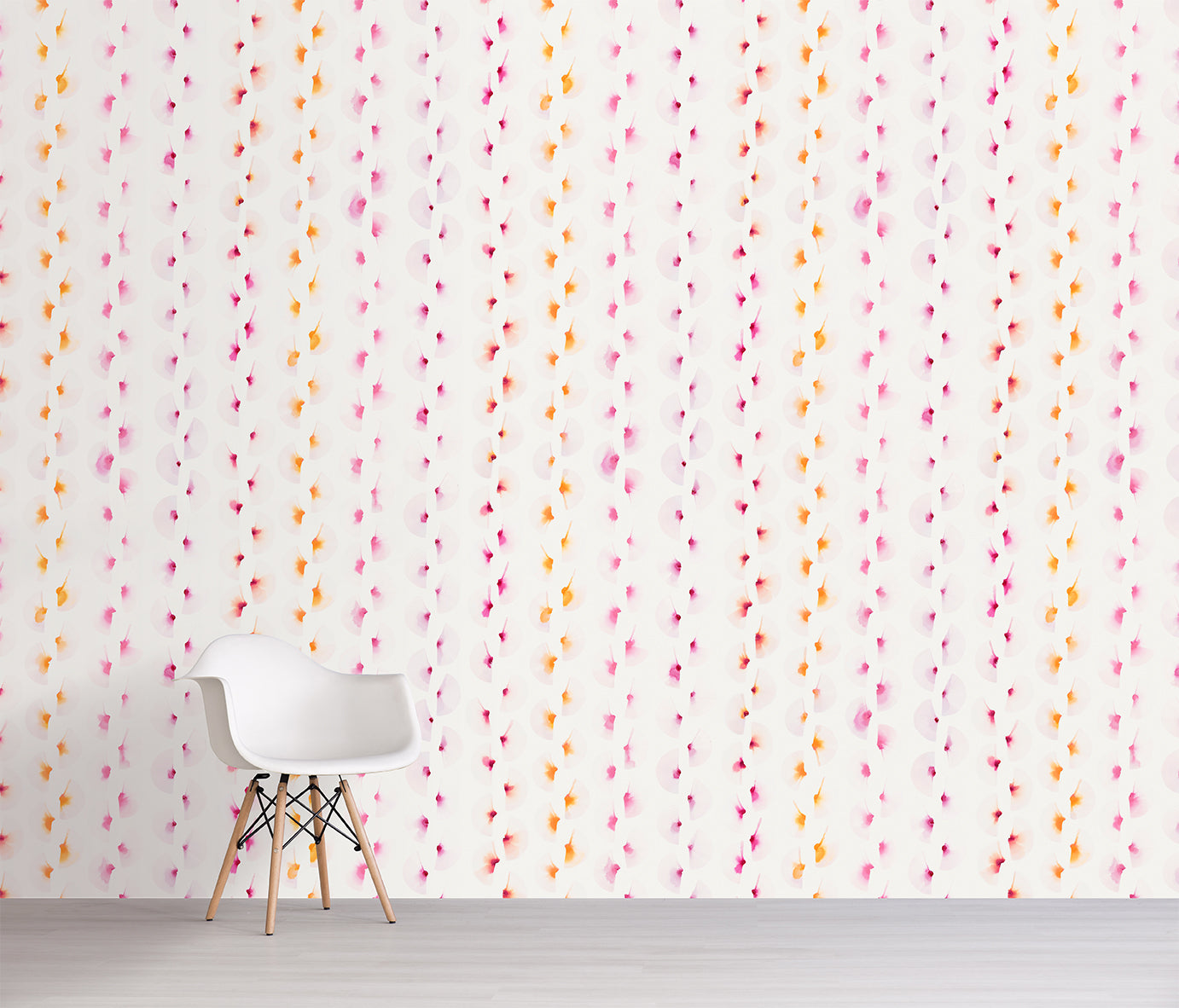 Wallpaper with colorful pink and yellow vertical lines in a room with a white chair.