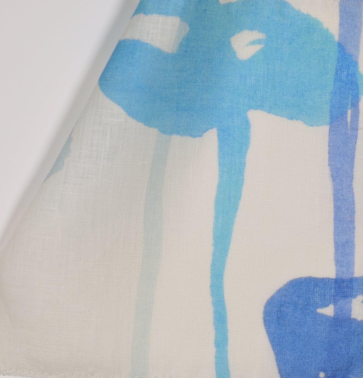 Blue floral design on light sheer fabric