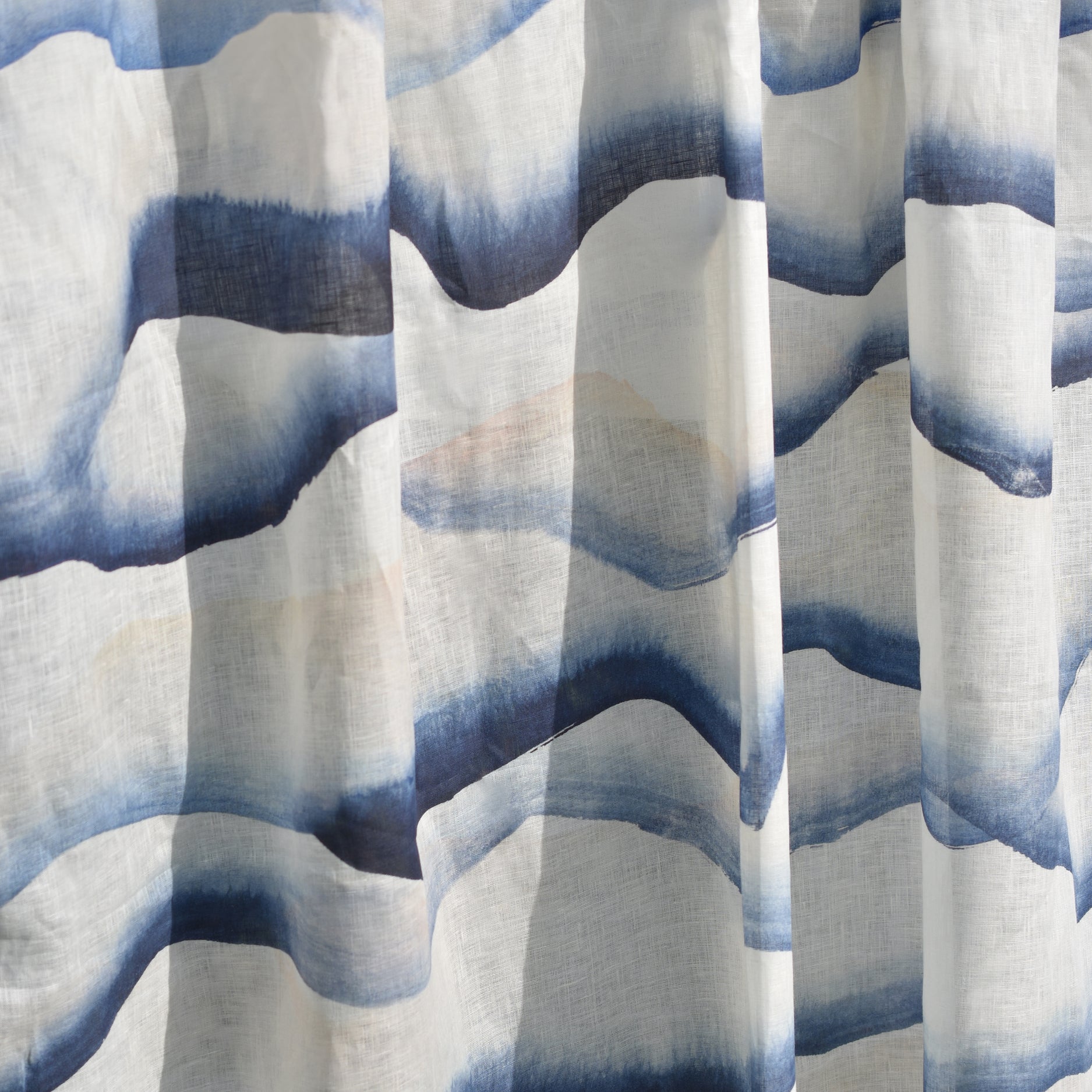 Curtain with blue and white wavy pattern