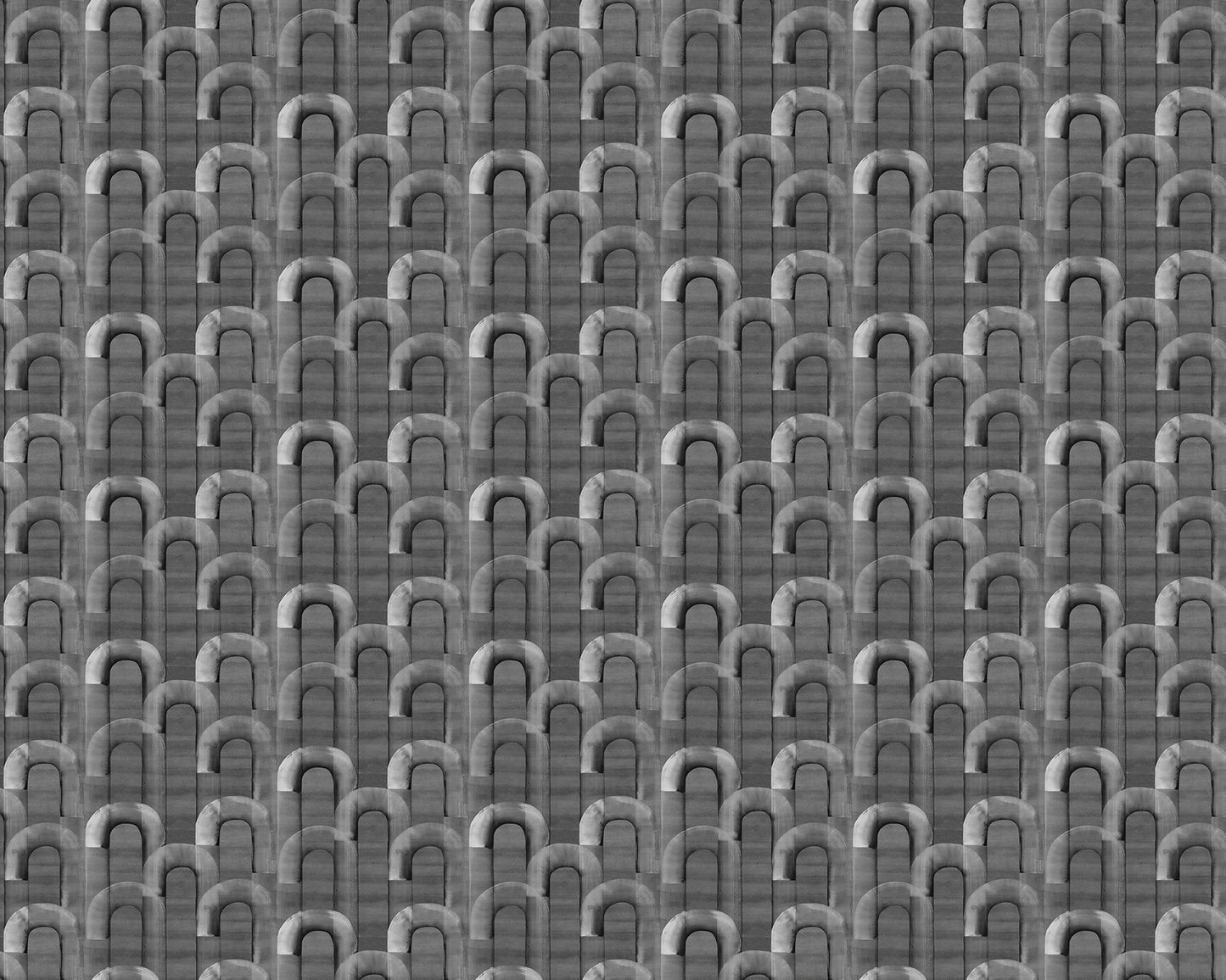 Pattern of arches in a grid layout on a gray background