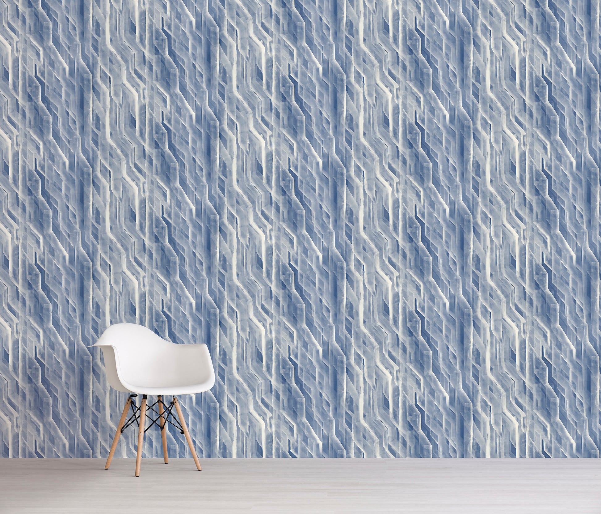 White chair against a blue geometric patterned wall
