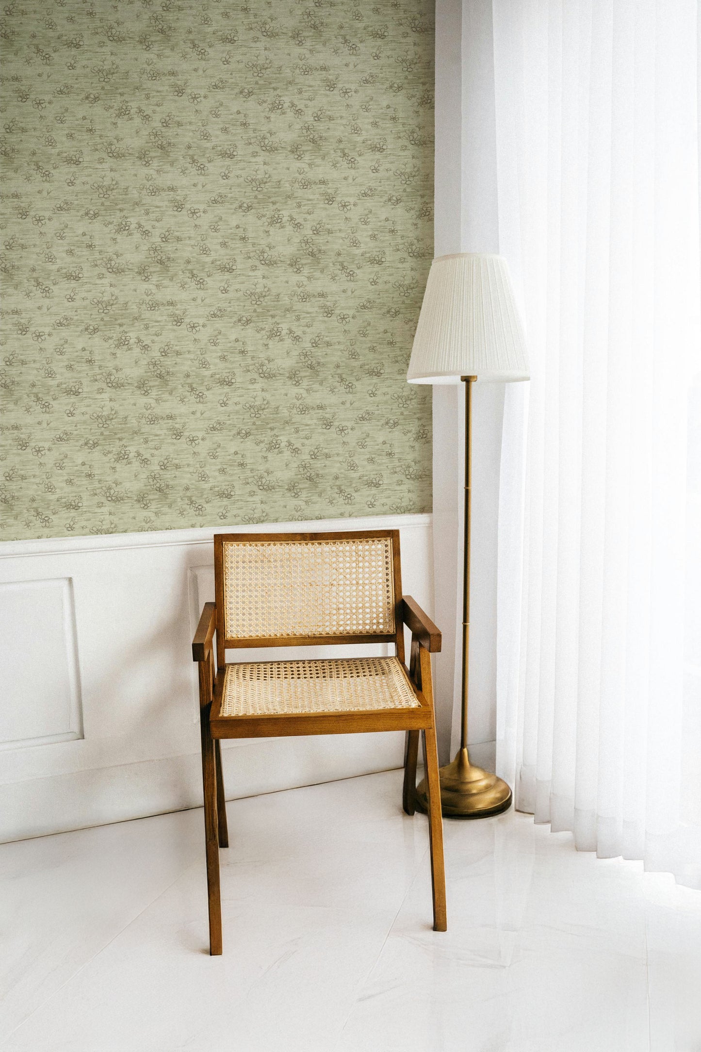 Wooden chair with wicker backrest against a light green wall with subtle pattern