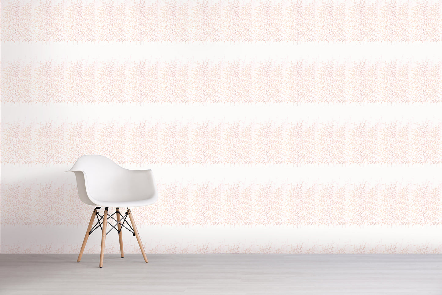 White chair with wooden legs against a light pink textured wall.