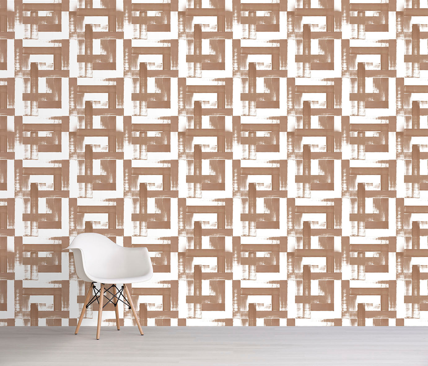 Geometric patterned wallpaper with a chair in front